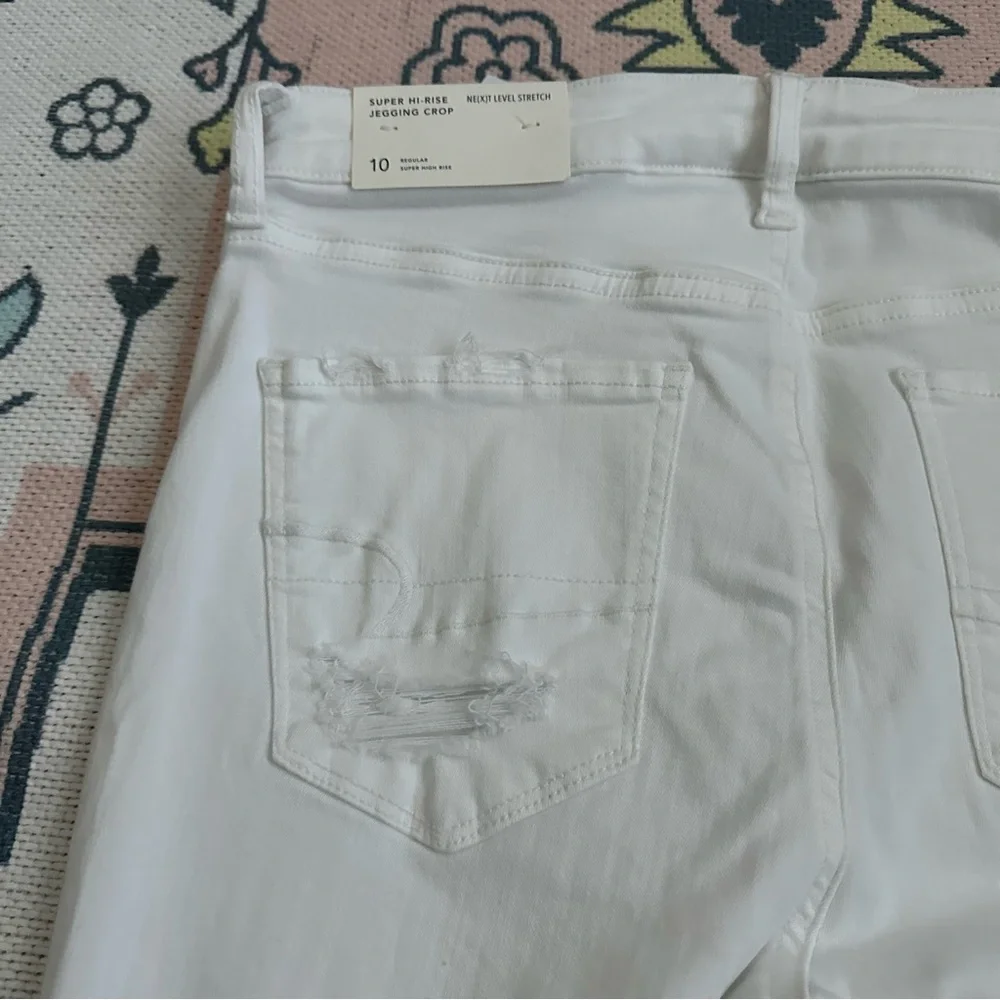 American Eagle White Stretch Ripped Super Hi-Rise Jegging Crop Jeans - Picture 13 of 16